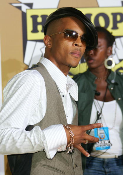 T.I. reppin’ the East Coast, leather hat to the side.