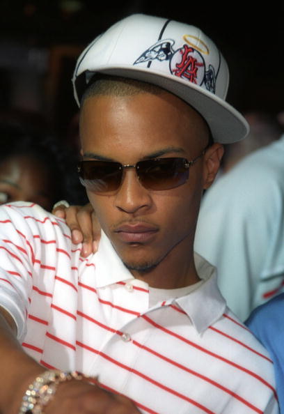 T.I. wearing his fitted his favorite way.