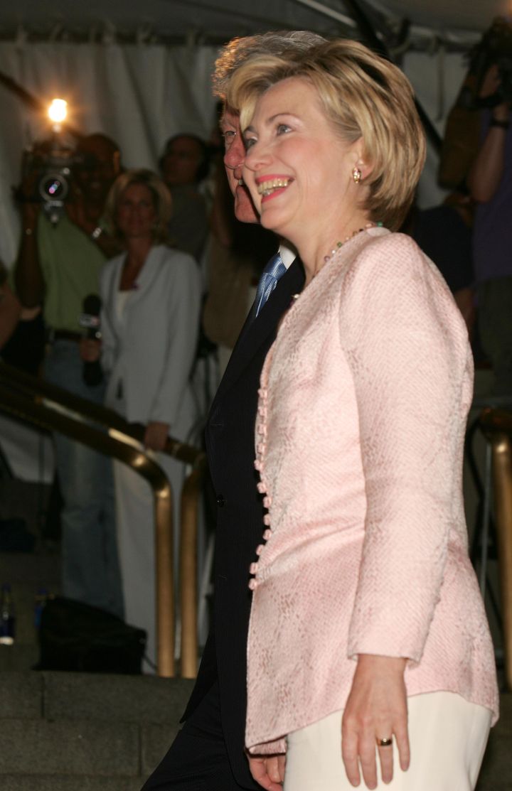 June 2004: Hillary’s lighter looks were always welcoming, but the lace embroidered pattern was a standout during an appearance with Bill Clinton in New York.