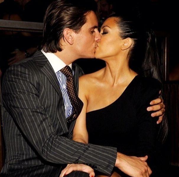Scott and Kourtney share an elegant kiss.