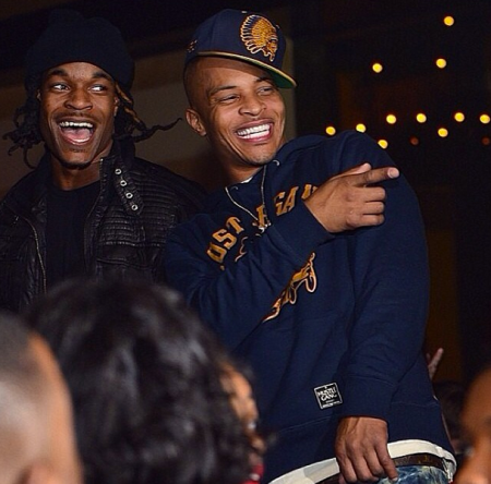 T.I. laughing with friends.
