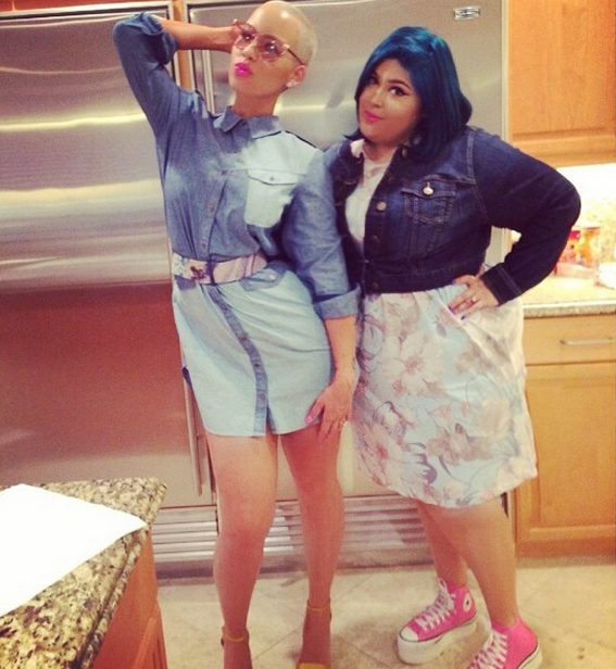 Amber Rose hangs with a friend early in the morning.