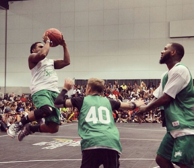 Bobby V gets some air while taking on The Game