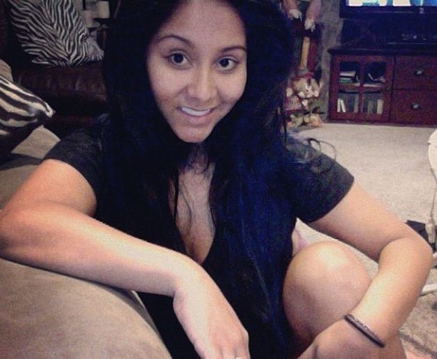 Snooki is all smiles and over the heavy makeup from her “Jersey Shore” days.