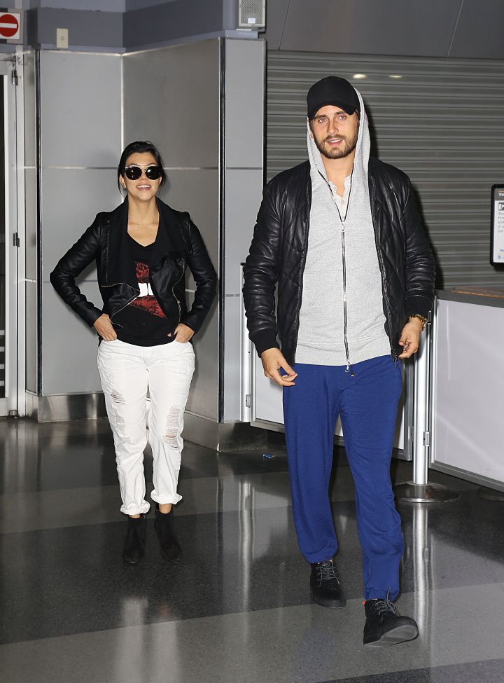 Kourtney and Scott being cute at the airport.