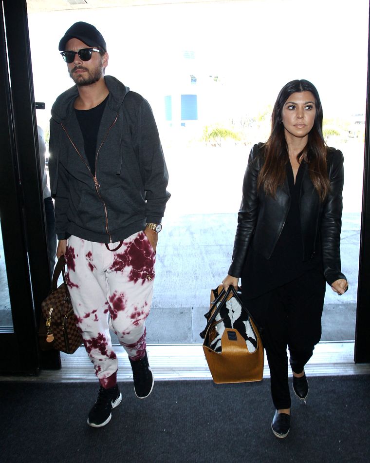 Scott and Kourtney leaving LAX.