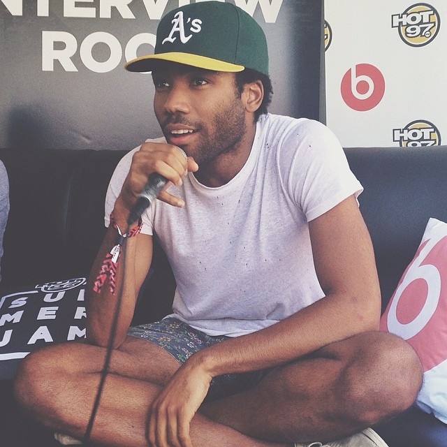 Childish Gambino stopped for interviews before taking the stage.