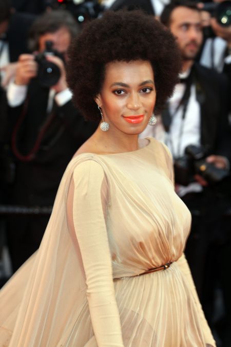 Solo brought in 2013 with her reliable afro.