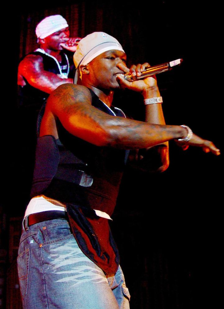 50 Cent performing in the black tank.