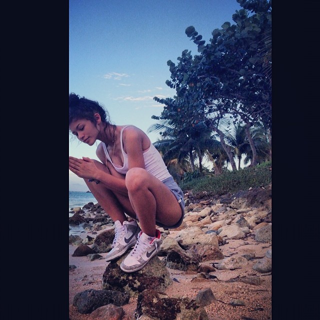 Zendaya meditated on a rock during her trip to Jamaica. Adorbs.