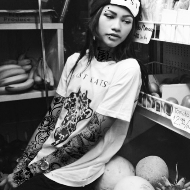 She’s even adorable rocking faux tat sleeves on both arms.