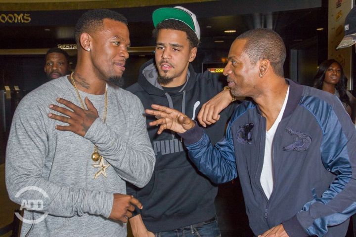 Booby Gibson, J. Cole, & Tony Rock pose for a picture.