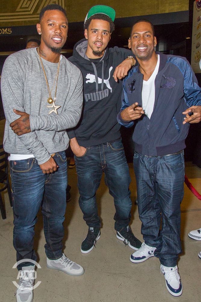 Booby Gibson, J. Cole, & Tony Rock pose for a picture.