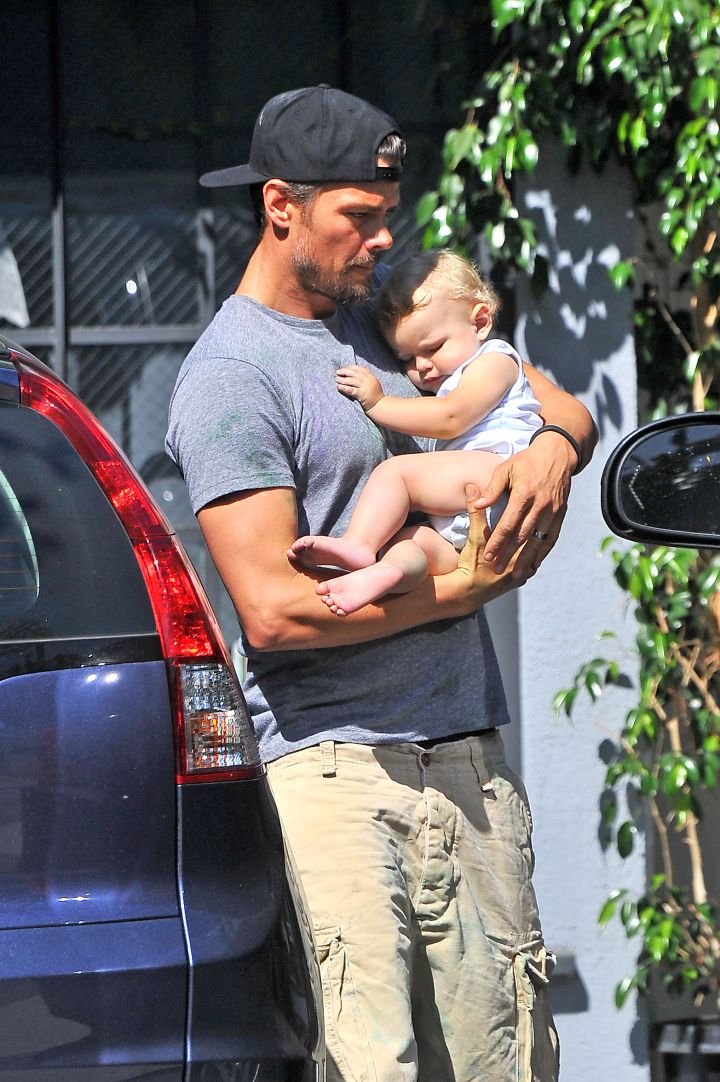 Josh Duhamel carries his son Axl as he and Fergie head out on a quick errand trip in Beverly Hills.