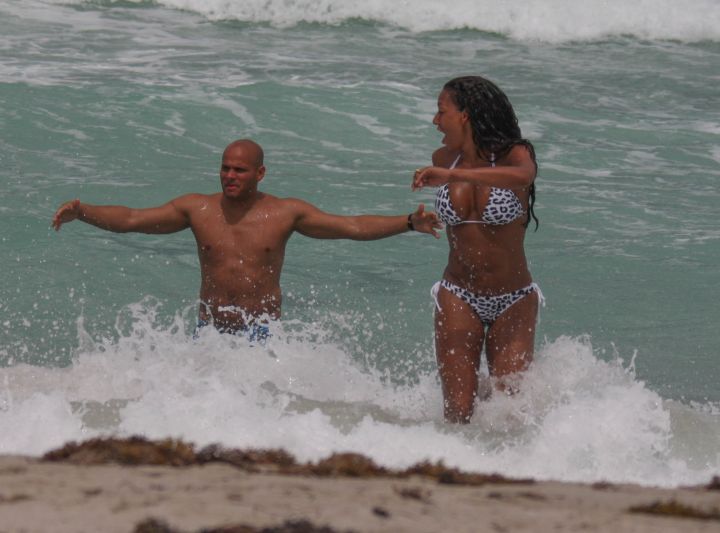 Melanie Brown and her husband enjoy the Miami Beach waves.