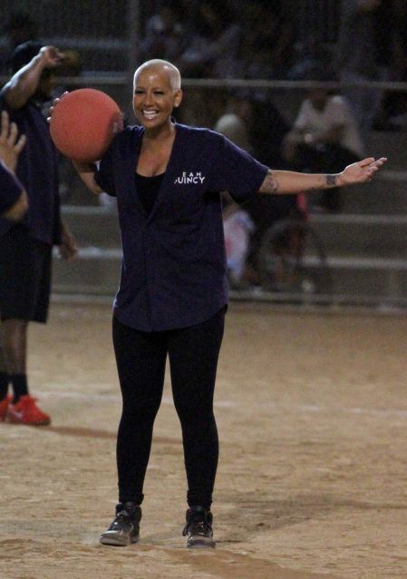 Amber Rose competes with a huge smile on her face