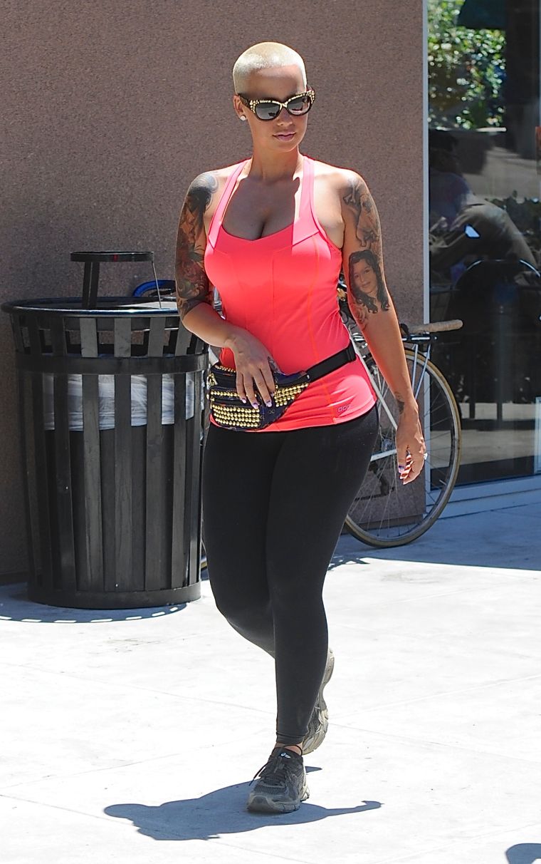 Amber Rose rocks a fanny pack while on her way to Starbucks.