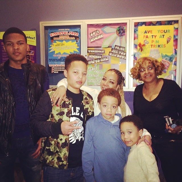 Tiny posed with her kids and T.I.’s sister.