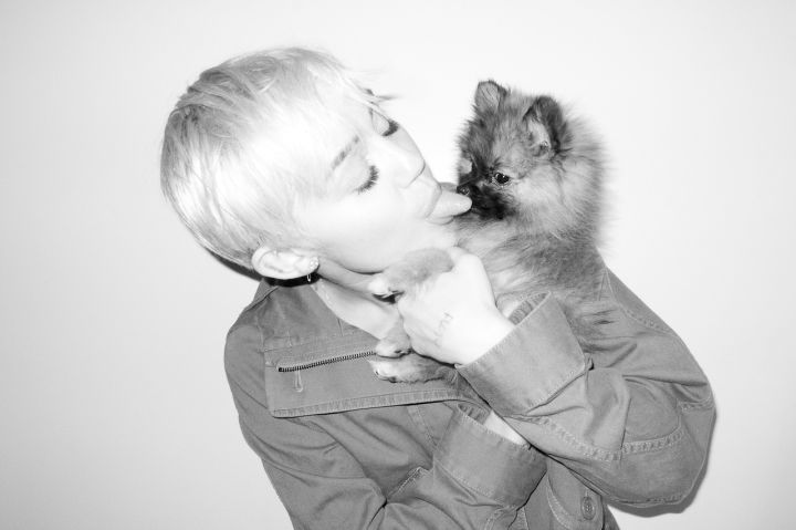 Miley Cyrus and pup pose for Terry Richardson.