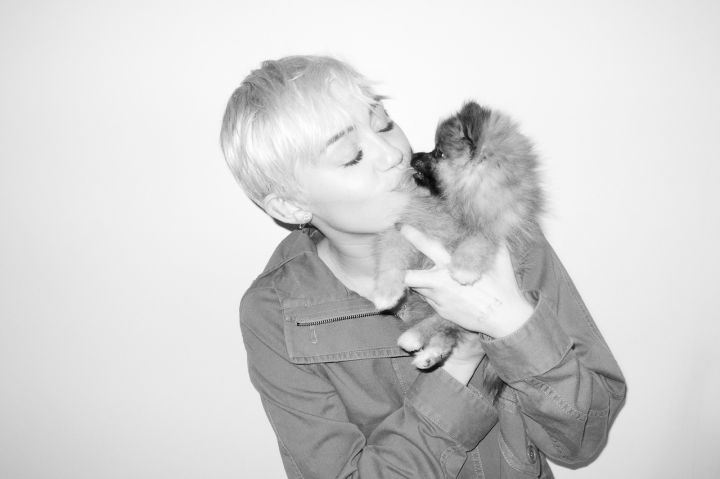 Miley Cyrus and her puppy pose for Terry Richardson.