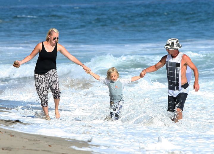 It’s a day at the beach for Gwen Stefani and husband Gavin Rossdale, as they splash with their son Zuma.
