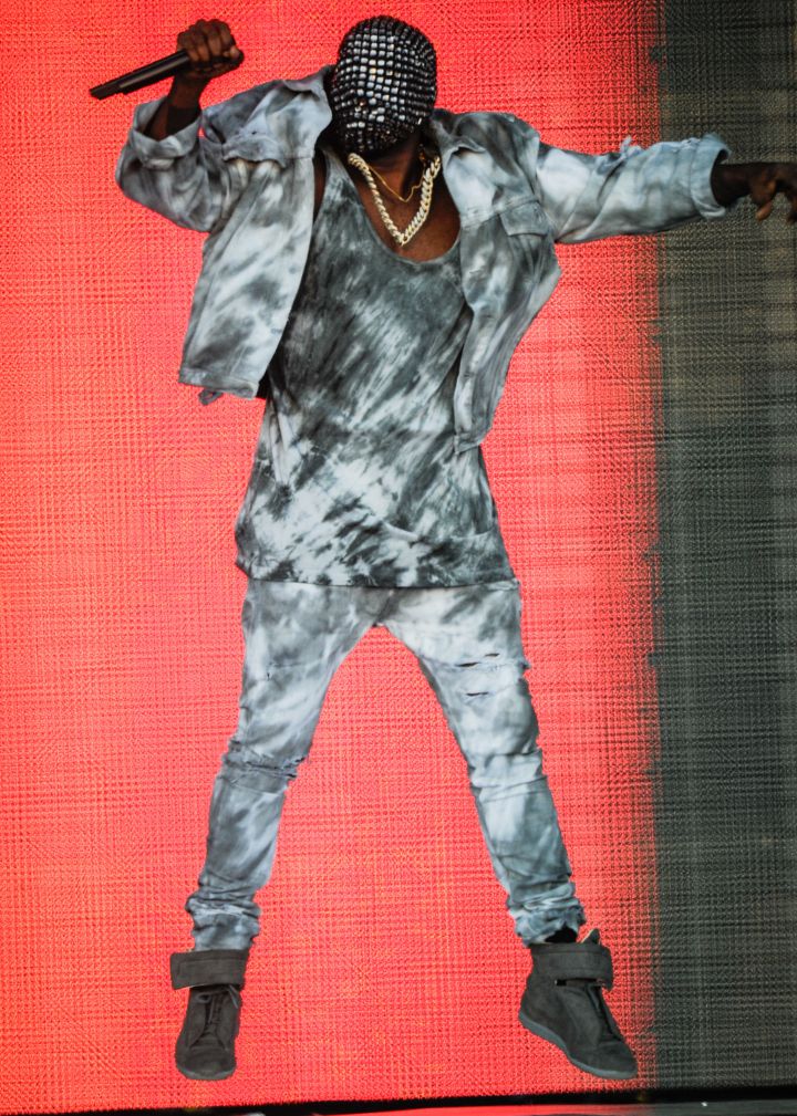 Masked: Kanye West performs at the Wireless Festival in Birmingham.