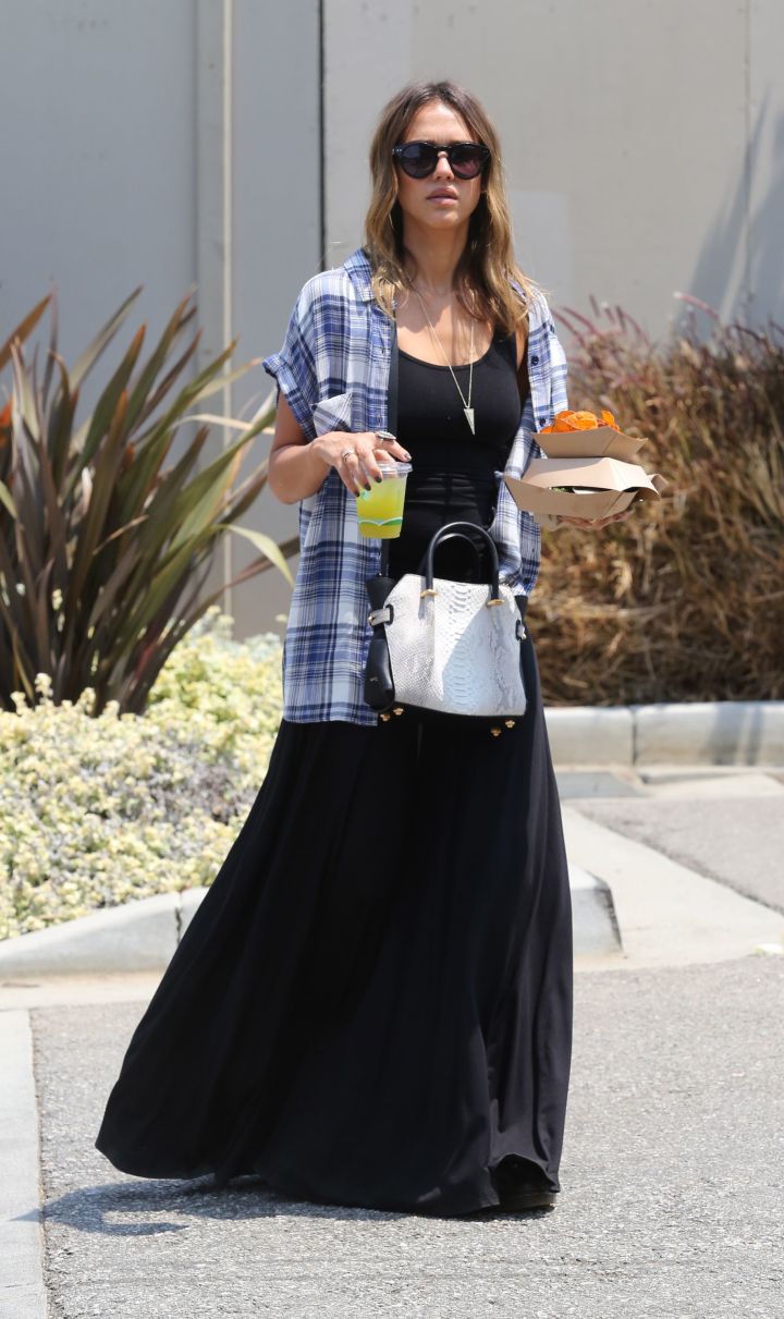 Yum! Jessica Alba dressed down in a black maxi-dress and tartan top to grab lunch at trendy Los Angeles food trucks.