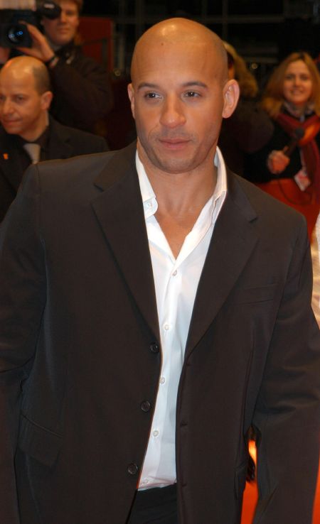 Okay, okay. Vin Diesel in a suit.