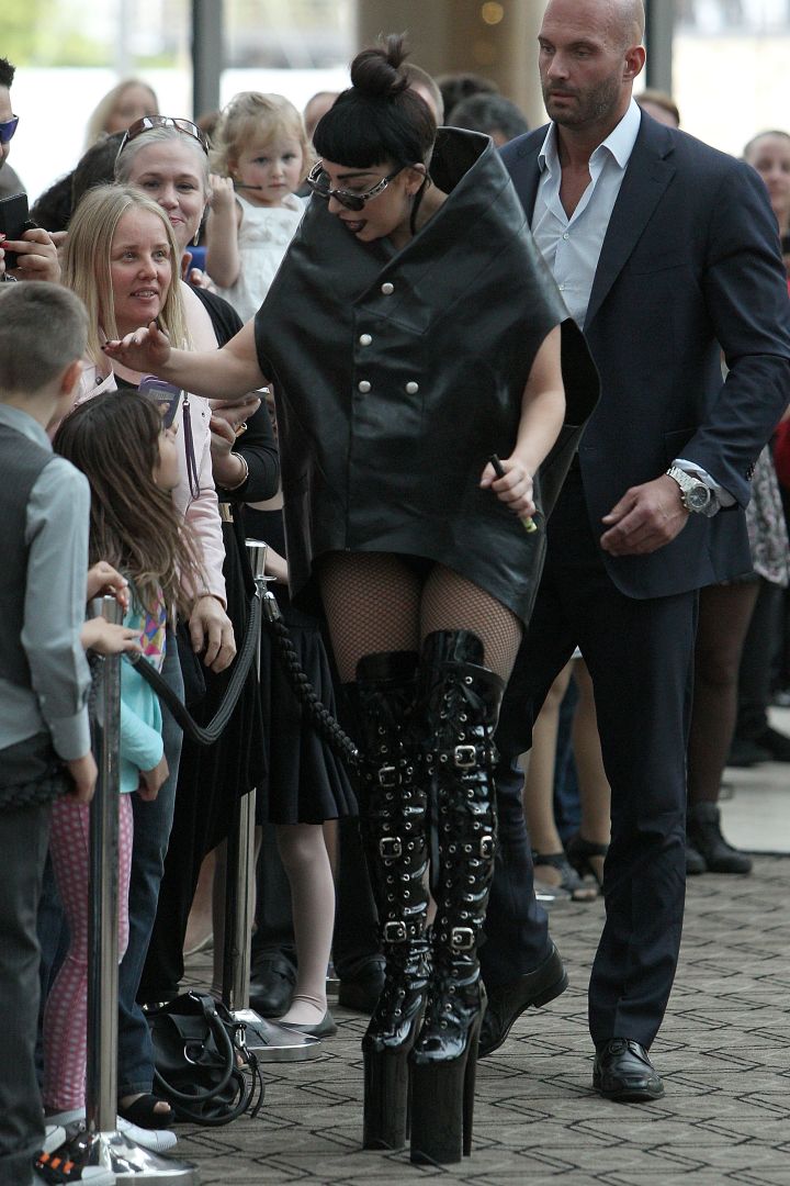 Lady Gaga greets a young fan while at the Crown Metropol in Perth, Australia.