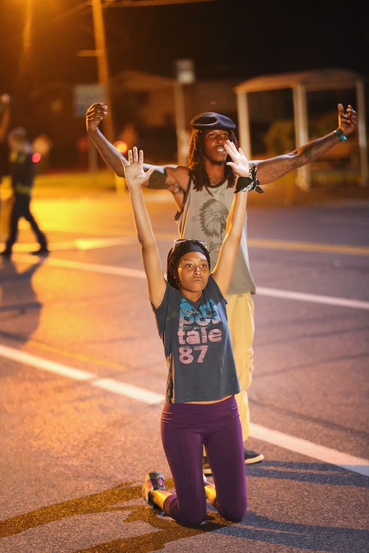 Demonstrators in the streets of Ferguson protest after the killing of unarmed teen Michael Brown.