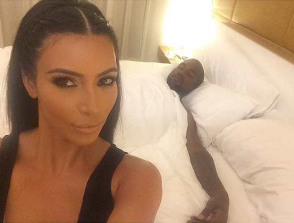 Kim captioned this “Side chicks be like…”
