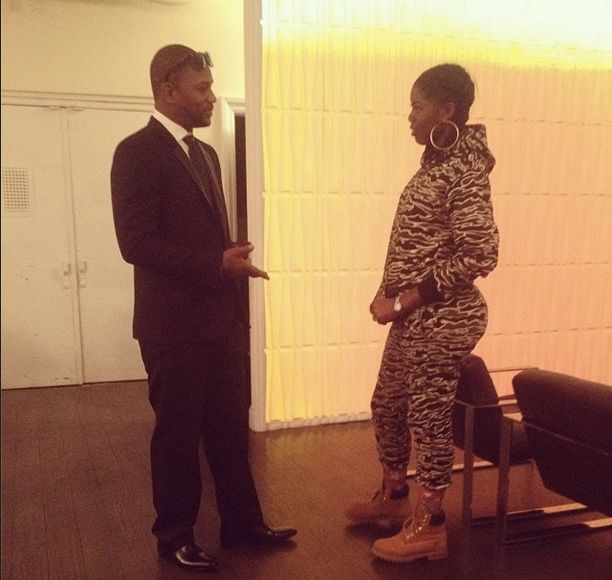 …or Cam, rocking traditional doorman garb?