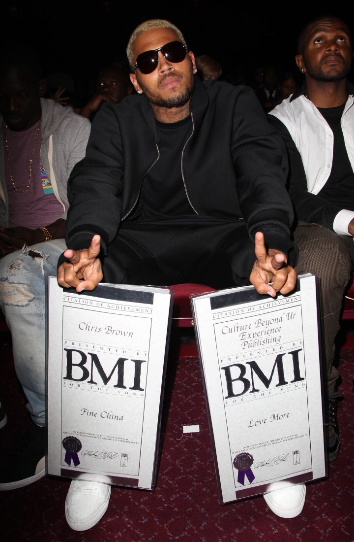 Chris Brown poses with his BMI Awards.