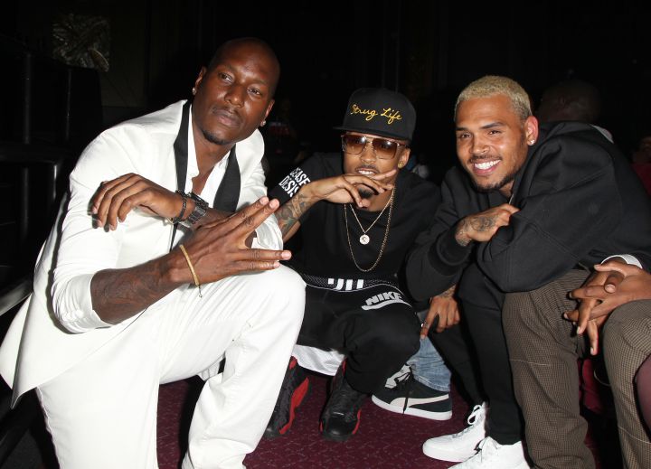 Tyrese, August Alsina, and Chris Brown pose together.