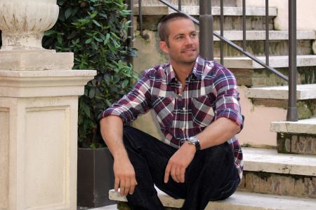 Walker poses for promo photos while shooting “Fast & Furious 5” in Rome in 2011.