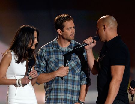 Paul and the rest of the “Fast & Furious” crew accept an award for their amazing work at the 2013 MTV Movie Awards.