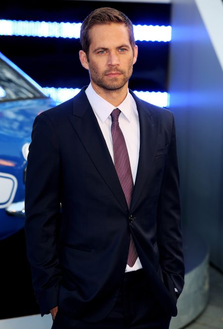 Walker rocks blue and purple for the “Fast & Furious 6” world premiere in 2013.