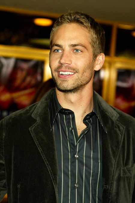 Paul steps out in a crushed velvet suit jacket at the premiere of “Timeline” in 2003.