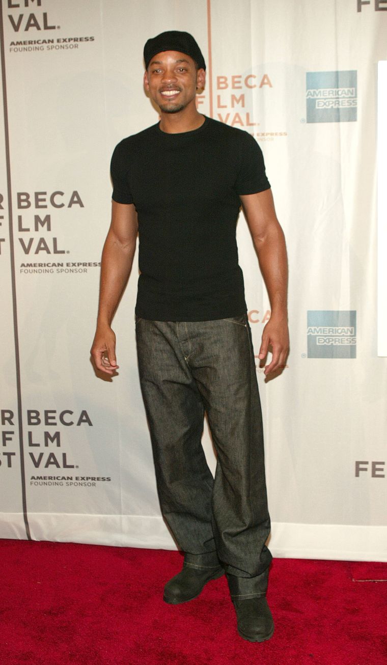 Will tries to be modest while covering up those muscles of his.