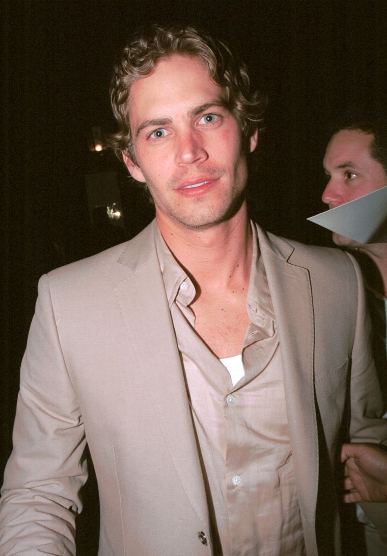 Walker and other celebrities party the night away after the 2002 Oscar’s.