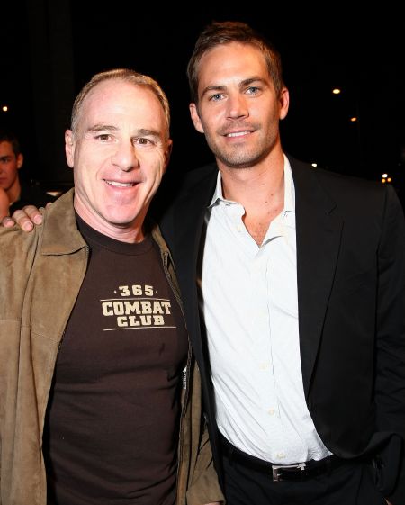 Paul poses alongside David Zelon, the producer behind the “Fast & Furious” franchise, at the premiere of “Never Back Down” in 2008.