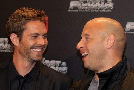 Paul and Vin, who were not only co-stars, but close friends, share a laugh before heading in to the “Fast & Furious” premiere in 2009.