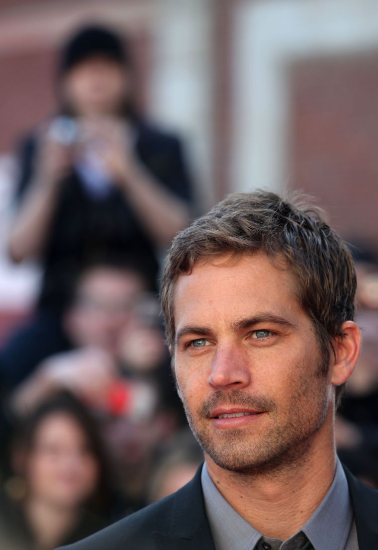 Paul and the rest of the “Fast & Furious” family gather for a photocall for “Fast & Furious 4” in 2009.