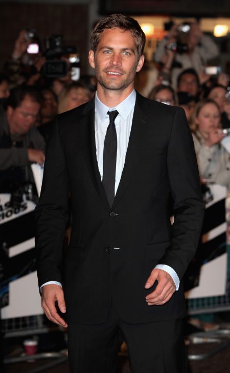 Walker sports classic black and white for the 2009 European premiere of “Fast & Furious 4.”