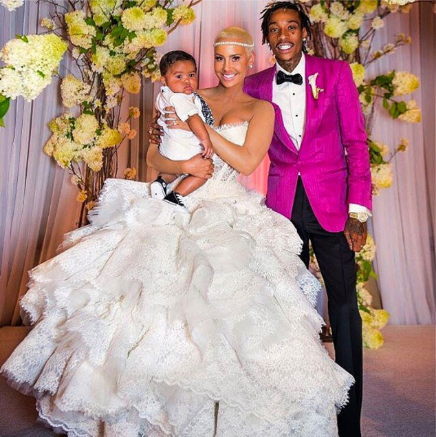 A year after he popped the question, Wiz and Amber tied the knot with Baby Bash by their side.