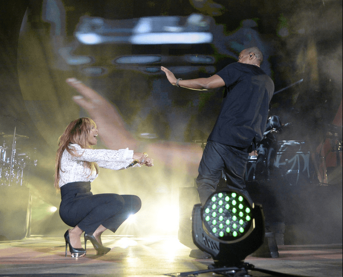 Bey drops it low for her hubby!