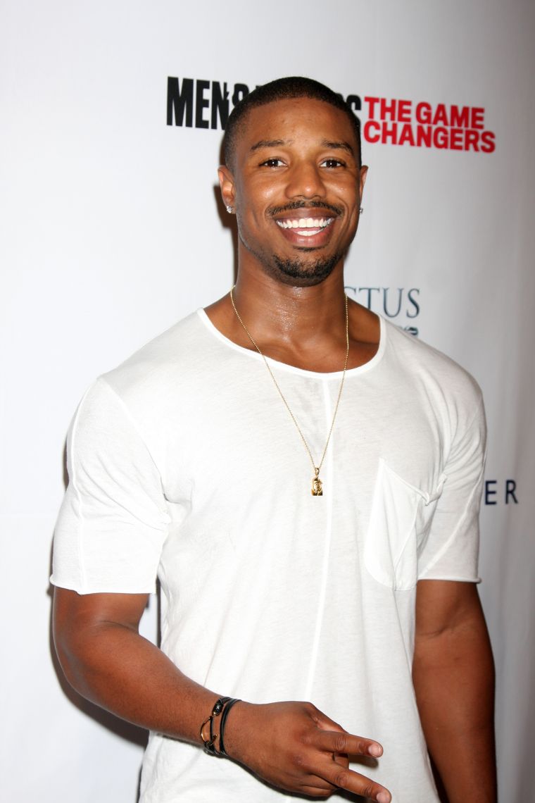 Michael B. Jordan shows off that million dollar smile as he arrives at the 2014 Men’s Fitness ‘Game Changers’ Celebration.