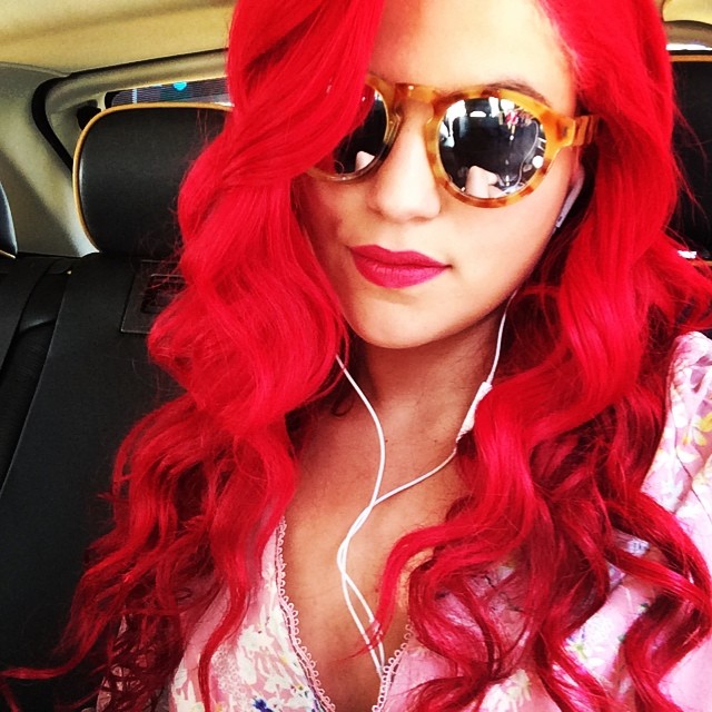 Carly is always red hot.