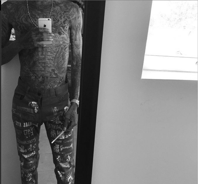 Selfie Time With His New iPhone 6…Oh, and He’s “Done” With His Chest and Arm Tattoos.