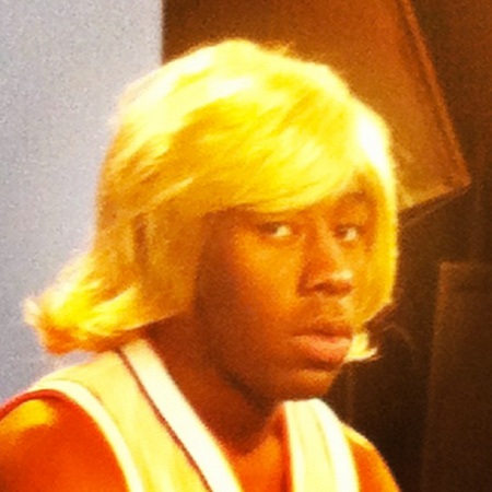 This is Tyler, The Creator with a cute blonde bob.